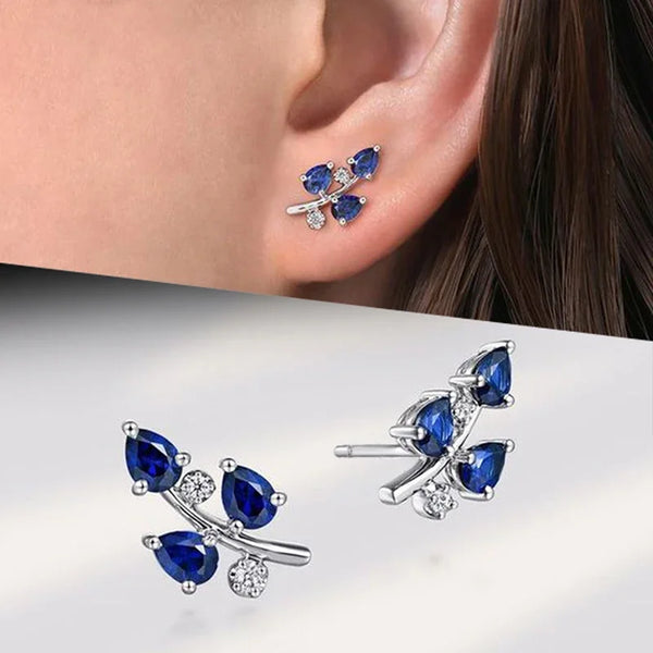 CAOSHI Boucles d'oreilles à tige en cristal bleu chic en forme de feuille pour la vie quotidienne, bijoux polyvalents pour femmes, accessoires de couleur argent